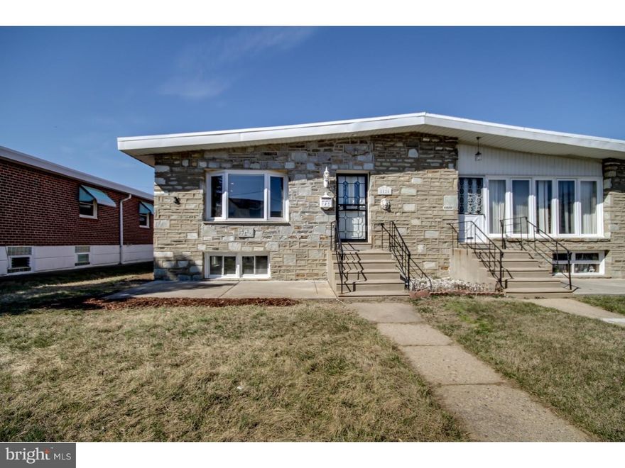 Completely rehabbed Twin with all new kitchen, bathrooms hardwood floors central air finished basement Ready to move right in