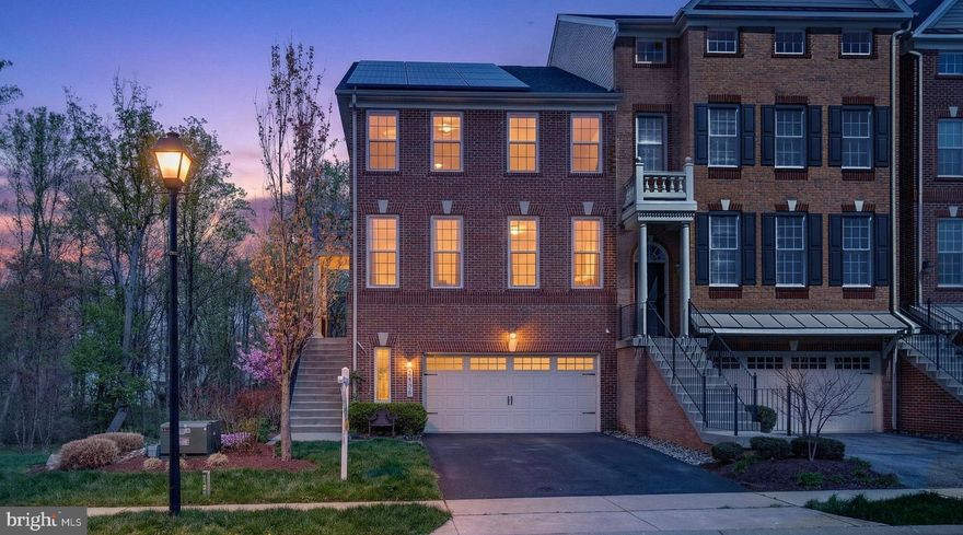 Exquisite Toll Brothers Townhome in Arundel Forest on Premium Lot!!! Welcome to this beautifully maintained Ellicott model by Toll Brothers. Prime location offers privacy and serene views. Trees on the back and open space on the side. Oversized 2 car garage with storage area. End unit. 4 ft extension on all 3 levels. Beautiful hardwood floors and oak stairs. Open concept main floor. Chefs kitchen features 42 inches dark cabinets, granite countertops, top of the line SS appliances (new refrigerator, dual oven, 6 burners GE Mongram Gas Range, exhaust fan above it) and plenty of space to cook and entertain. Kitchen is in the center of the main floor and is open to a breakfast area with glass sliding door leading to the expanded trex deck overlooking beautiful trees. Gas fireplace in the living room. Formal dining room and additional living space. Powder room on the main level. Owners suite features large bedroom with vaulted ceiling, sitting area, enclosed spa like bathroom ( dual vanity, step in shower with the bench and soaking tub) and walk in closet. 
2 more bedrooms, full bath and laundry room on the upper level. 
Fully finished basement offers sufficient space for a recreational room, gym, office, play room, etc. Glass sliding door to the private backyard with pavers overlooking serene trees. Dual zone HVAC system, 2 nest thermostats for ultimate comfort. Solar panels!!!
Arundel Forest  is a resort style community with great amenities ( outdoor pool, clubhouse, playground (2), walking trails) and convenient access to major routes 295, 95, 100, 32, shopping, entertainment. Minutes from Ft Meade, NSA, National Business Park. Centrally located between Baltimore, Annapolis and Washington DC. Don’t miss this rare opportunity! 3D tour and Floor plan available