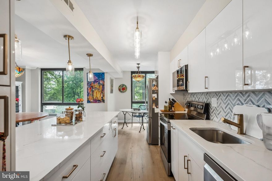 Welcome to this Modern Luxury Condo at The Encore of McLean! This 2-bedroom, 2-bathroom condo features a bright and spacious floor plan. As a corner unit on the 9th floor, it offers stunning views and an abundance of windows that fill the space with natural light. This beautifully renovated condo boasts new hardwood floors, fresh paint, and a fully renovated kitchen with new countertops, modern cabinets, backsplash, and brand-new appliances. The oversized balcony, overlooks  two sides of the building, overlooks treetops and the cityscape. Bright and inviting, the condo includes in-unit laundry, two enclosed garage spots, and extra storage. Located less than a mile from Tysons Corner Center and just steps to the metro, Wegmans, Capitol One Hall, and more, it offers unmatched convenience.
Enjoy community amenities such as pools, a fitness center with sauna, library, social rooms, 24-hour security, and concierge services. Live, work, and play in the vibrant heart of Tysons Corner—your dream home awaits!
Schedule your tour today!