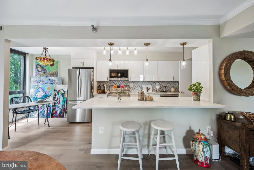 Welcome to this Modern Luxury Condo at The Encore of McLean! This 2-bedroom, 2-bathroom condo features a bright and spacious floor plan. As a corner unit on the 9th floor, it offers stunning views and an abundance of windows that fill the space with natural light. This beautifully renovated condo boasts new hardwood floors, fresh paint, and a fully renovated kitchen with new countertops, modern cabinets, backsplash, and brand-new appliances. The oversized balcony, overlooks  two sides of the building, overlooks treetops and the cityscape. Bright and inviting, the condo includes in-unit laundry, two enclosed garage spots, and extra storage. Located less than a mile from Tysons Corner Center and just steps to the metro, Wegmans, Capitol One Hall, and more, it offers unmatched convenience.
Enjoy community amenities such as pools, a fitness center with sauna, library, social rooms, 24-hour security, and concierge services. Live, work, and play in the vibrant heart of Tysons Corner—your dream home awaits!
Schedule your tour today!