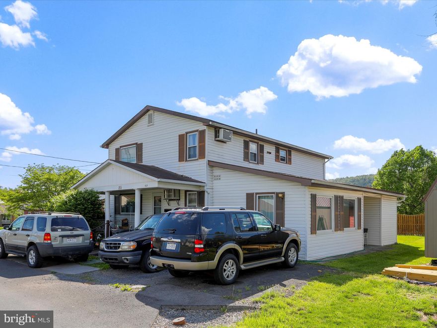 Fully rented triplex just minutes from Rt. 50 in Romney WV. ! Main level unit features 3 bedrooms, 1 full bath, spacious living room, and kitchen with LVP flooring and full appliance package. Private carport/patio off the back and covered front porch. Upper unit includes 2 bedrooms, full bath with tub/shower combo, hardwood floors throughout, and kitchen/dining combo with dishwasher, oven/stove, and fridge. Lower unit offers 1 bedroom, 1 bath, and open kitchen/living area. Public water and sewer. Strong investment opportunity with immediate rental income in a convenient commuter location.