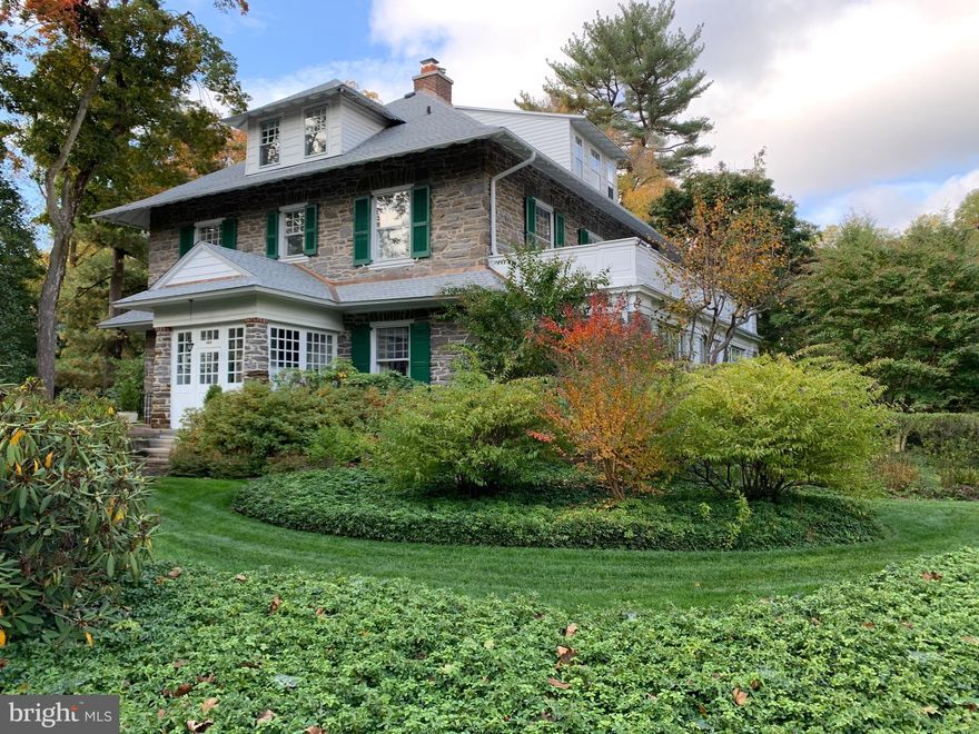 Rare opportunity to own a quintessential Main Line stone colonial in Lower Merion's hottest neighborhood...the welcoming, sidewalk community of Northside Ardmore!    First time offered in nearly 50 years.   Lovingly and meticulously maintained, this is an extraordinary property to indulge with your personal updates and touches.  High ceilings, grand spaces plus all the character and grace you would expect from a home of this era are combined with "great bones" and an unmatched location.  This extraordinary home is situated on an oversized, level parcel, ideally located steps from the Ardmore Farmers' Market, LifeTime Fitness, Trader Joe's, the Septa/Amtrak train station and all the shops and restaurants of Suburban Square.  From the quaint front portico, you will enter into an impressive living room featuring a beautiful woodburning fireplace as the focal point and proportioned to furnish multiple conversation areas.  French doors lead to a refreshing sunroom that spans the entire side of the home.   Featuring Mercer Tile and walls of windows, this bright and cheerful space overlooks the park-like plantings and sweeping expanse of the side yard.   The classic formal dining room is sized to accommodate large gatherings entertaining and features beautiful built in corner cabinets for showing off china, crystal or serving pieces.  A butler's pantry with cabinets, shelving and a laundry area leads to the eat-in kitchen with gas cooking and a footprint that allows for easy updating.   An enclosed porch off the kitchen offers easy access to the 4 car detached garage and oversized private driveway.  A powder room and coat closet complete the 1st floor.    Up the steps to the 2nd floor, you will  find an ensuite bedroom featuring an updated (2018) full bathroom w large shower and separate sitting room.  Next is a gracious study adorned with traditional built-in bookcases and a cozy fireplace; the perfect spot for a home office.   Two additional, large bedrooms are across the hall with ample closet space and jack-and-jill full bath.   At the end of the hall, doors open to the sunroom roof, offering the potential for a 2nd floor terrace.  The 3rd floor presents four additional bedrooms, each impressive in their own right, offering generous proportions, brightness, high ceilings and good closets.   A large full bath completes this level.  The unfinished full basement with walk-out egress provides tremendous storage space.  A whole-house generator protects you from losing electrical and gas service during storms.    New roof, new gutters and restored chimney in 2019.   Walk to LM High School, places of worship, The Ardmore Music Hall and more!