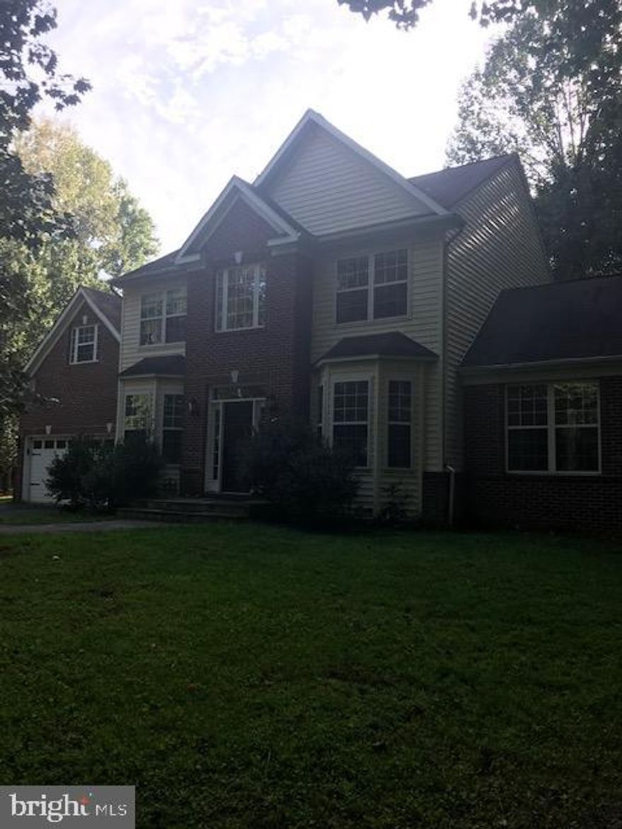 Calling all DIY people.  This home needs paint, flooring  and updating but you can choose what works best for you.  Great location off of 234 By pass and Hoadly Road.  This home is on water and sewer but on over an acre.  Its a great floor plan with the living room and dining room to the front of the house both with bays.  The kitchen is open to the family room and has a breakast bar, island, large table space and loads of cabinet space.  The Dining room wall will need some drywall attention but the leak has been fixed.  The lower level had some water due to a broken sump pump which has been fixed.  Come create your instant equity.