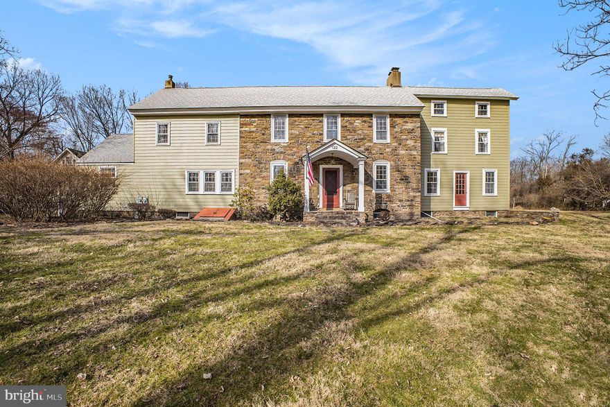 Nestled within the historic Mount Eyre Neighborhood, this exceptional Bucks County gem exudes timeless elegance and modern comfort. Originally crafted by Abraham Harvey circa 1750, this Pre-Revolutionary War home boasts a storied past while seamlessly blending historic charm with contemporary conveniences.
Spanning three gracious levels, the home showcases original wide plank floors, high ceilings, and exposed beams, creating an atmosphere of rustic sophistication. Sunlight streams through beveled glass windows, illuminating the spacious rooms adorned with custom moldings and original wood doors, each exuding its own unique character.
The heart of the home lies on the first floor, where an updated kitchen awaits with granite counters, built-in appliances, and a propane gas stove, complemented by a large walk-in pantry. A grand great room, anchored by stone fireplaces at each end, invites gatherings with built-in window seats and a Dutch-style barn door leading to the front porch.
Flexible living spaces abound, with two rear rooms offering versatility as a family room and office, complete with a full bathroom and separate entrance ideal for a home office. Ascend the rear staircase to discover a private master suite, featuring a newly renovated bath with dual sinks and a spacious dressing room, with access to a third-floor retreat perfect for a home office or walk-in closet.
The second floor hosts three additional bedrooms, two boasting stone fireplaces, and an updated full bath, accompanied by convenient upstairs laundry. A fifth bedroom on the third floor offers hardwood floors and undeniable charm.
Outside, the property dazzles with its expansive three-acre grounds and charming exterior buildings. A large Double Door barn, equipped with electricity and plumbing, doubles as a garage and captivating entertainment space on the upper level, complete with projection TV, half bath, and climate control.
Updates abound, including central air, a new boiler, roof, and electrical upgrades, ensuring modern comfort without compromising the home's historic integrity. With top-rated schools and easy access to I-95, Princeton, New York, and Philadelphia, this enchanting residence offers a truly unparalleled lifestyle opportunity. Come experience the timeless allure and unmatched quality of this remarkable Bucks County treasure.