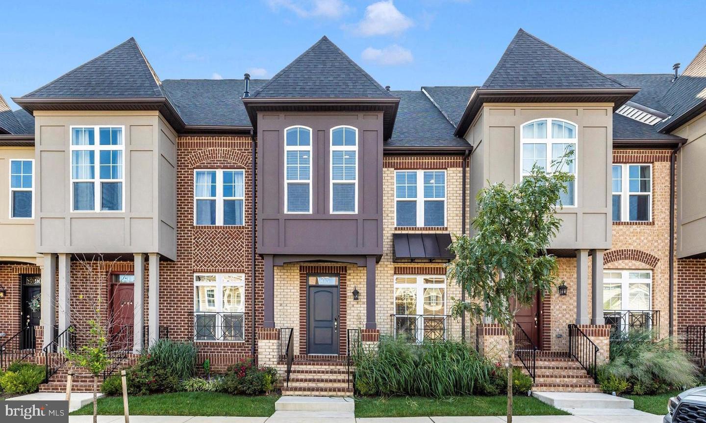 Welcome to 905 Holden Road, an exceptional Ashby model townhome in the highly sought-after EastChurch community. This is not just a house; it's a statement of style and quality craftsmanship, perfected for modern living.
Step inside and immediately feel the sense of space and light. The main level's open floor plan, with its 9-foot ceilings and hardwood floors, is built for effortless entertaining. The half bath, completely renovated, is a stylish detail, but the true centerpiece is the gourmet kitchen. It's a chef's delight, complete with a massive quartz island, stainless steel appliances, and a gas range. The kitchen seamlessly connects to the living area, which is highlighted by a cozy gas fireplace—the ideal spot for relaxation.
Upstairs, the bedrooms are tranquil retreats. The freshly painted primary suite features elegant crown molding and two expansive custom closets with built-ins, while the secondary bedrooms have been finished with fresh paint, new flooring, and elegant crown molding. The upper-level laundry makes daily chores a breeze.
The fully finished basement is a game-changer. It offers a comfortable recreation room and a versatile private bedroom, perfect for guests or a dedicated home office. The spa-like bathroom is a standout, recently renovated top to bottom, boasting a custom glass shower, a modern vanity, and new tile. Best of all, a rare walk-out with full-sized windows floods the space with natural light, making it feel every bit as open and inviting as the main level.
Every detail, from the expansive 2025 renovations to the home's superb location, confirms its value. EastChurch offers a true "lock-and-go" lifestyle, with a community pool, recreation center, and HOA services that handle maintenance—all just a short stroll from the history and culture of downtown Frederick. This home is ready to impress. Mortgage savings may be available for buyers of this listing.