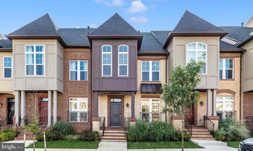 Welcome to 905 Holden Road, an exceptional Ashby model townhome in the highly sought-after EastChurch community. This is not just a house; it's a statement of style and quality craftsmanship, perfected for modern living.
Step inside and immediately feel the sense of space and light. The main level's open floor plan, with its 9-foot ceilings and hardwood floors, is built for effortless entertaining. The half bath, completely renovated, is a stylish detail, but the true centerpiece is the gourmet kitchen. It's a chef's delight, complete with a massive quartz island, stainless steel appliances, and a gas range. The kitchen seamlessly connects to the living area, which is highlighted by a cozy gas fireplace—the ideal spot for relaxation.
Upstairs, the bedrooms are tranquil retreats. The freshly painted primary suite features elegant crown molding and two expansive custom closets with built-ins, while the secondary bedrooms have been finished with fresh paint, new flooring, and elegant crown molding. The upper-level laundry makes daily chores a breeze.
The fully finished basement is a game-changer. It offers a comfortable recreation room and a versatile private bedroom, perfect for guests or a dedicated home office. The spa-like bathroom is a standout, recently renovated top to bottom, boasting a custom glass shower, a modern vanity, and new tile. Best of all, a rare walk-out with full-sized windows floods the space with natural light, making it feel every bit as open and inviting as the main level.
Every detail, from the expansive 2025 renovations to the home's superb location, confirms its value. EastChurch offers a true "lock-and-go" lifestyle, with a community pool, recreation center, and HOA services that handle maintenance—all just a short stroll from the history and culture of downtown Frederick. This home is ready to impress. Mortgage savings may be available for buyers of this listing.