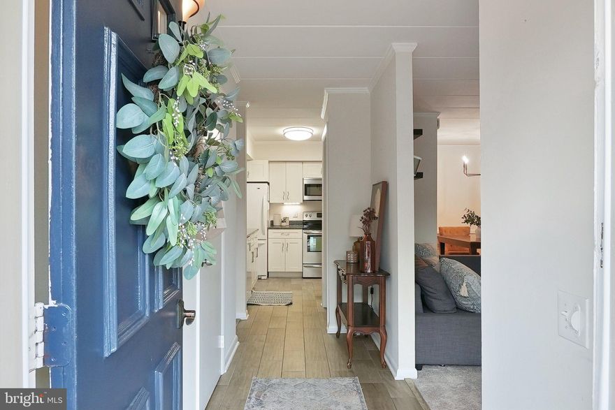 Best deal in all of Beverly Hills! The Terrace Townhouses of Beverly Hills is a garden-style townhome community in Alexandria less than a block from some of the best coffee shops, gourmet food & beverage shops, shopping, pet groomers and more! You'll love this picturesque 2 bed/2 full bath with an abundance of storage that has been freshly painted this year, an updated kitchen with a walk-in pantry w/ in-unit laundry, working fireplace and updated bathrooms. Both living and dining areas have new carpet (2025), and the primary suite includes a spacious dual vanity with walk-in closet. The condo fee of $361/month covers trash, water, sewer, exterior maintenance, and management, and designated parking spot #57- keeping upkeep simple. The location offers easy access to daily necessities and transportation. St. Elmo’s Coffee Pub, Rampart’s Tavern, and Fern Street Gourmet Beer & Wine are all within a block, making it easy to grab coffee, a meal, or groceries without going far. Several parks and walking trails are also nearby. Commuting is straightforward, with Reagan National Airport just 6 miles away (about an 11-minute drive) and downtown D.C. 7.2 miles away (roughly 17 minutes by car). Major roads like I-395 and Route 7 are close by, and public transit options, including bus stops and Metro stations, are easily accessible. If you’re looking for a home that combines convenience, comfort, and easy access to the best of Alexandria and D.C., then this condo is the perfect fit!