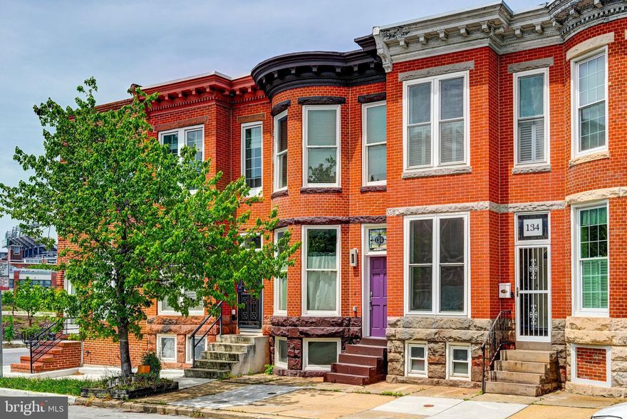 This is a really charming, renovated home in Federal Hill WITH PARKING for 2 CARS. These lots are super deep, so you have a nice sized deck, yard with pavers, plus 2 car parking out back! Hard to get at this price point. The brick accent walls with beautiful archway pattern add so much charm to this home. The main level has 2 living spaces, plus a dining area, updated kitchen and powder room. Upstairs are three bedrooms, two full baths (one en-suite) and a second deck off the back. The laundry room is located on the bedroom level for ease and convenience. There is a full unfinished basement with interior access that has good height. Stroll over to M&T Bank Stadium for game days. Top Golf and so many great amenities within blocks!