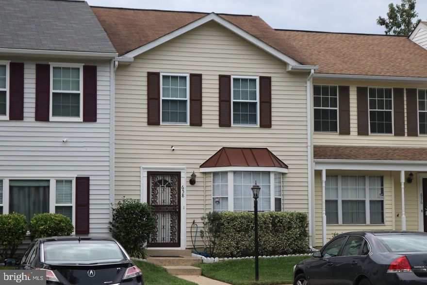 Simple elegance and beauty describe this rare find. Seller has taken meticulous care. Seller hates to go now that he has spruced up for sale. Open the front door and you are greeted by gleaming hardwood flooring, gracefully painted walls, an upgraded kitchen, step down dining room with pricey chandelier and dimmer switch. Powder room is at the front of house as you step in. Up the stairs and the gleam continues. Generous size owner's suite with full bath. Two additional bedrooms and a hall bath make this beauty complete. Will go quickly.  Be sure to check out the fenced backyard, the lawn sprinkler and security system which will stay. Great community with easy access to community college, outstanding grade schools, shopping, the beltway, metro. Have it all. Come well qualified and ready to go to settlement.  Call helpful agent with any questions.