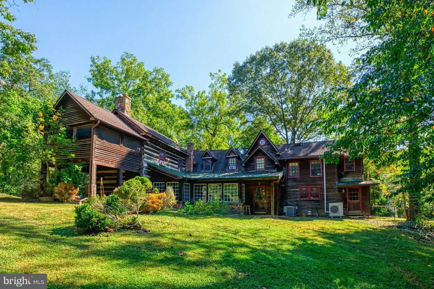 A rare and extraordinary offering—13.49 acres across two adjoining parcels at 5250 and 5360 Winfield Road, now available together for $3,750,000. This HISTORIC estate, known as Winfield Farm,(circa 1790 1815) features four separate residential structures, providing outstanding value and versatility. Residences include a main log farmhouse (5 bedrooms, 3.5 baths), a second home (3 bedrooms, 2.5 baths), a third carriage house (3 bedrooms, 1.5 baths), and two additional dwellings, including a fourth house on the adjacent 5-acre parcel. This collection of buildings includes a refurbished, air-conditioned two-level barn (currently used as office space), riding rings, horse stables, fenced pastures, gazebos, a stocked pond with fountain, carriage barn, chicken house, and smokehouse—all set within a mix of level open fields and mature wooded areas. No RPA encumbrances exist on the 5-acre parcel, offering a prime opportunity to build or expand. Fairfax County zoning allows for a wide range of uses, including Bed and Breakfast, Short-Term Lodging, Farm Winery, Brewery or Distillery, Religious Assembly, School, Group Living, Equestrian Facility, Cultural Center, and more. Existing lease through June 2026 adds potential income stream. Located just minutes from Fairfax County Parkway, Route 29, Route 66, and Dulles Airport, this property offers an unmatched blend of privacy, historic character, development flexibility, and convenience in a highly desirable Northern Virginia location.