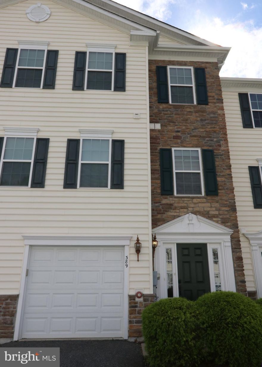 If you're looking for a move-in ready, low-maintenance home in Chester County, consider Valley Township, and take a drive past this nicely maintained 3 Bedroom, 3 Full Bath townhouse in Coatesville's Round Hill.  Conveniently located near shopping & dining & sited near the rear perimeter of the community, this is it! This home offers a Built-in Garage that provides interior access to a 1st Floor Bedroom (or Recreation room, if you prefer) and a Full Bath, and this room's walk-out sliding door accesses exterior common area. Alternatively, ascend the staircase to the Main level, taking note as you do of NEW carpeting spanning most living spaces. Hardwood flooring adorns the Kitchen, which has solid surface countertops, built in appliances & a double sink. Set up bar stools to enjoy your meals at the Kitchen counter or, more formally in the nearby Dining room. The open floor plan features  high ceilings & a large Living room, one that include a sliding glass door to allow you to step outside onto an elevated, Trex-surfaced Deck, to enjoy the sunshine with your morning coffee.  The upper floor Laundry is conveniently located near sleeping quarters, which includes a modestly-sized Bedroom and a lavishly-sized Master, boasting multiple Walk-in closets and a Master Bath outfitted with both a stall shower and a soaking tub. Come see your next home, before someone beats you to it! The square footage identified is Public Records Assessor data. Seller's own measurements indicate the actual square footage may be closer to 2000 sqft, but the veracity thereof should be verified by agents and Buyers.