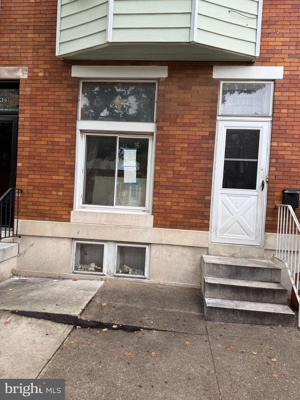 Photo of 411 S Macon Street, BALTIMORE, MD 21224 (MLS # MDBA2191214)