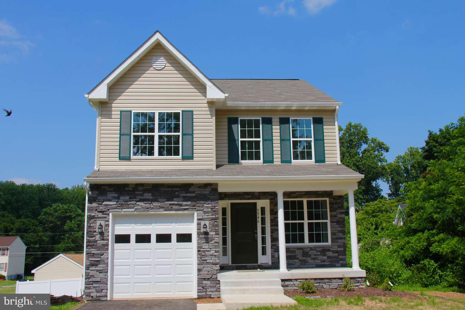 New 4 bedroom 2.5 bath home ready for immediate delivery! Main level has beautiful flooring throughout the living, kitchen and dining rooms. The kitchen features cabinets with soft close drawers, granite countertops and peninsula bar seating. Pantry area, laundry, and half bath complete the main floor. Upper level contains master bedroom with large walk-in shower, walk-in closet, 3 additional bedrooms, and full hallway bath. Garage with opener and plenty of driveway and street parking. Basement can be finished for another bedroom and full bath. Big backyard with plenty of room for swimming pool, playset or other outdoor enjoyment. Energy star home with 2/10 warranty. No HOA.