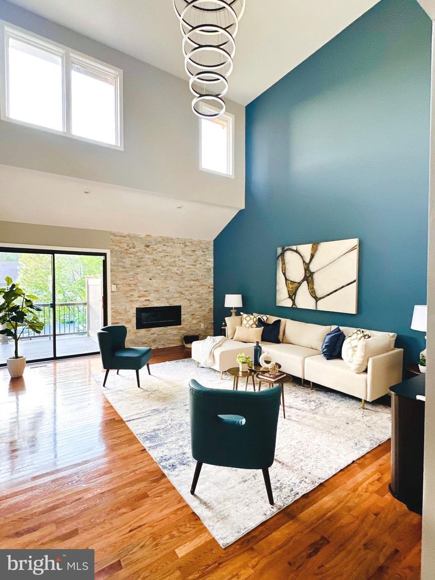 Welcome to an elegantly renovated town home in the desirable Montrose Village! This 4 -bedroom, 3.5-bath town home is in like new condition with every detail meticulously updated. Towering ceilings, hard wood floors throughout, and modern amenities boast style and sophistication throughout. The front entrance is bright and welcoming and sets the tone for the rest of the home. To the left is the all white modern open kitchen with stainless steel appliances, island, custom cabinets and quartz countertops. The grand living room with tall windows sheds an abundance of natural light and an accent wall adds character to the space. The nicely sized dining room is great for dinner parties. It’s sun-filled and opens to the living room with two-story ceilings and an electric fireplace. Two sets of glass sliding doors open to the spacious, new treks deck. A stylish powder room, main floor with one of two primary suites and an office/multi purpose room complete this floor. The second floor is home to two bedrooms, including the second primary suite with a large ensuite bathroom featuring a double sink vanity, walk-in shower and a walk-in closet. The guest suite is very spacious, with a nice -sized closet/Laundry room. The third floor is home to the fourth bedroom which also can be used as flex shape.  This townhome is perfectly placed in a central location within walking distance of Rosemont Village, as well as downtown Bryn Mawr with restaurants, shopping and public transportation making it easy to commute in and out of Center City. This gem of a home will be an absolute pleasure for its new owners! Note: All the units recently had new exterior paint, all new roofs and new stucco. This unit recently replaced most of the windows.