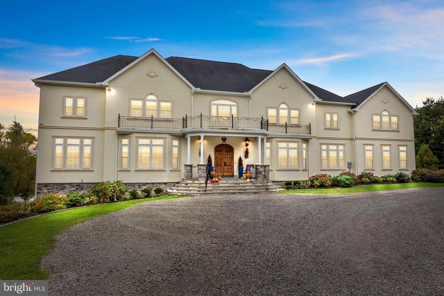 Custom Resort-Style Estate with Breathtaking Valley Views in Council Rock North School District
Indulge in an unparalleled lifestyle within this custom-built, 5-bedroom, 5.5-bath single-family home, situated on a serene 5.40-acre lot with panoramic valley views. Enter the grand, two-story stone foyer and be greeted by sheer elegance and exquisite design. This sophisticated estate seamlessly blends luxurious indoor living with a magnificent resort-style outdoor oasis, creating the ultimate retreat for discerning buyers.
The heart of the home is the chef's kitchen, featuring top-of-the-line appliances, including a Sub-Zero refrigerator/freezer, an Italian ILVE eight-burner gas range, a Miele dishwasher, and a walk-in pantry. Beyond the kitchen, you will find: A private, first-floor home office , A bright sunroom overlooking the landscaped backyard. The second floor features four large bedrooms, each with its own private bath and walk-in closets, plus a delightful secret bonus room currently set up as a playroom. Throughout the home, enjoy a built-in speaker and central vacuum system. This home features a convenient first and second-floor laundry rooms, with a dedicated dog shower on the main level.
The newly finished basement elevates entertainment to new heights with a custom live-edge wet bar and kegerator, a temperature-controlled wine room, and a padded floor gym. Step directly from the basement into your outdoor paradise, which features a spectacular saltwater pool complete with a waterfall, waterslide, and enchanting grotto. The bluestone patio and covered deck with a built-in custom grill and second kegerator offer year-round entertainment possibilities. The property also includes a secure custom chicken coop.
 This extraordinary property provides the perfect combination of privacy, luxury, and entertainment for grand celebrations or quiet moments alike. All of this is located in the highly-acclaimed Council Rock North School district. This exceptional opportunity  won't last long—schedule your private tour today.
This home is withing a short drive to either Trenton or Doylestown Airports.  NYC  and Philadelphia are also with in a commutable distance.