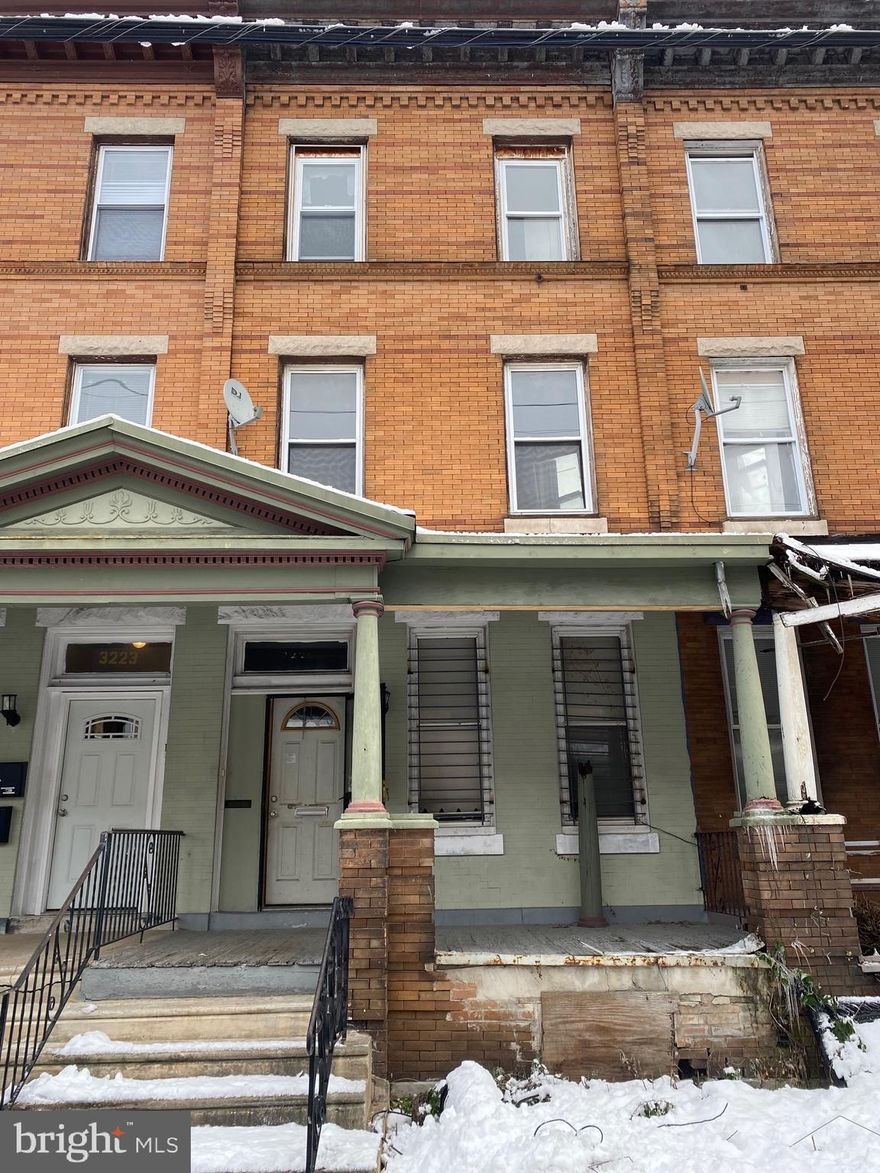 Property is in need of a complete Renovation. Fix this property up to be an income producing Triplex just off Broad street! Very Close Proximity to Temple University Hospital and just a short drive to Temple University.  Property is Being Sold "AS-IS Where IS". Buyer responsible for property sales cert.  Property will not be cleaned out.