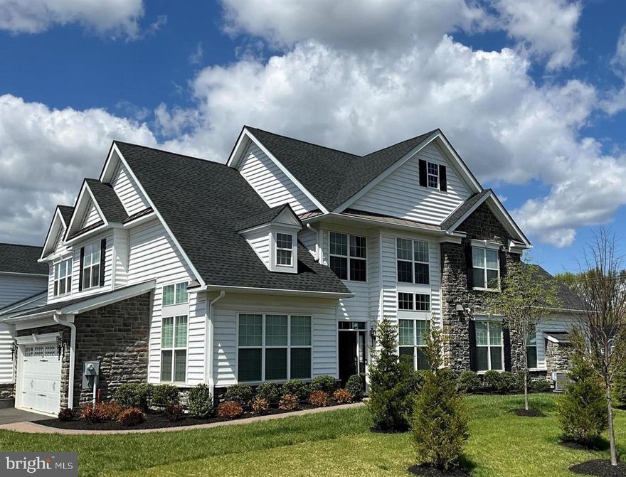 **55+ COMMUNITY**  Welcome to 1712 Sunflower Way, situated in the exclusive Regency at Yardley, an active-adult 55+ community offering a lifestyle of sophistication and comfort. This luxury Strathmere model carriage house with covered Bluestone entry and custom paver sidewalk greets you with a stately foyer framed by an elegant two-story grand Williamsburg oak staircase complete with custom crown molding and wainscoting. Accentuated with Mullican hand scraped maple hardwood floors with cappuccino finish throughout. The extended family room with 9 foot-ceilings is a masterpiece of design, boasting a dramatic vaulted ceiling and providing a spacious yet intimate gathering space for family and friends. The gourmet kitchen with granite counter tops, farmhouse sink, is a culinary delight, featuring top-of-the-line KitchenAid appliances and Century cabinets with Ginger stain adorned with enhanced crown molding, oversized pantry and breakfast area. The kitchen is seamlessly connected to bright & light gracious family room with gas vented fireplace and marble surround. The extended Grand master suite is conveniently located on the first floor and is a sanctuary of luxury. Designed with a recessed entry, tray ceiling, custom millwork and is a spacious sun filled room with natural light, offering a peaceful retreat for relaxation and views of the surrounding beauty. Master bedroom features a large walk-in closet and an opulent Travertine tiled en-suite bathroom. The oversized shower features a frameless clear glass shower enclosure with Travertine walls with custom Listello tile and ceramic shower floor. The first floor also hosts a tucked-away laundry room and conveniently located powder room. Second floor houses a spacious loft that overlooks the foyer below, providing an additional living area and office space. The are two additional guest rooms, perfect for the grand kids. There is a hobby room to escape to for your creative moments. Outdoors, the oversized Bluestone patio is tastefully landscaped and features custom lighting and with downspout extensions, creating an ideal setting for alfresco dining or evening relaxation. Additional features of this well-maintained home include, upgraded ceiling fans throughout, a 16-foot wide garage door and automatic fire sprinklers for added safety. State of the art $35,000 automatic remote-controlled window shades are installed in every room on the first floor for efficient natural light management. Strategically located in Lower Makefield Township, Bucks County, Pennsylvania, this property offers easy access to New York City, Philadelphia, and Princeton via Route 1 and I-95. A range of entertainment options, including golf courses and cultural venues, are within easy reach. Discover luxury and convenience at 1712 Sunflower Way. Schedule your private viewing today to experience this remarkable lifestyle for yourself.

Tenants to cover Electric, Water, Gas, Cable/Internet
Landlord to cover Trash/Sewer/HOA

**Landlord offering DISCOUNT on Rent for a 2 year lease**

As a resident of the Regency at Yardley community, you'll enjoy a wealth of amenities. The gated community features a 12,000+ sq. ft. clubhouse with indoor and outdoor pools, sports courts, and wellness facilities, all maintained by the Homeowners Association for your convenience