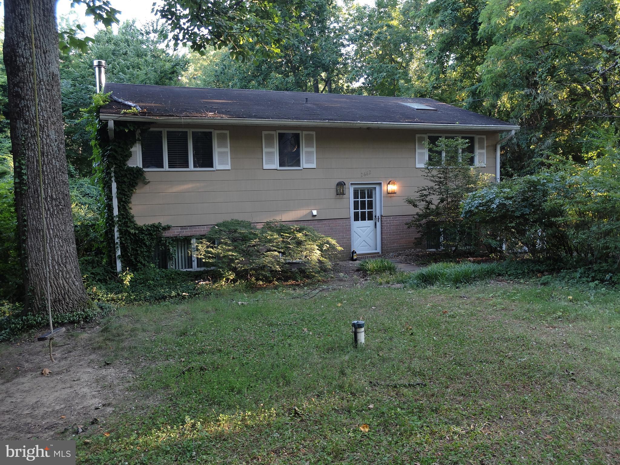 Tremendous opportunity to own this value priced home on a terrific lot in Annapolis Roads community at a town home price! Private lot; backs to woods. Community privileges include beach, boat ramp and kayak storage on Lake Ogleton. Huge deck to give access to the outdoors. Close to town but feels like you are on vacation!