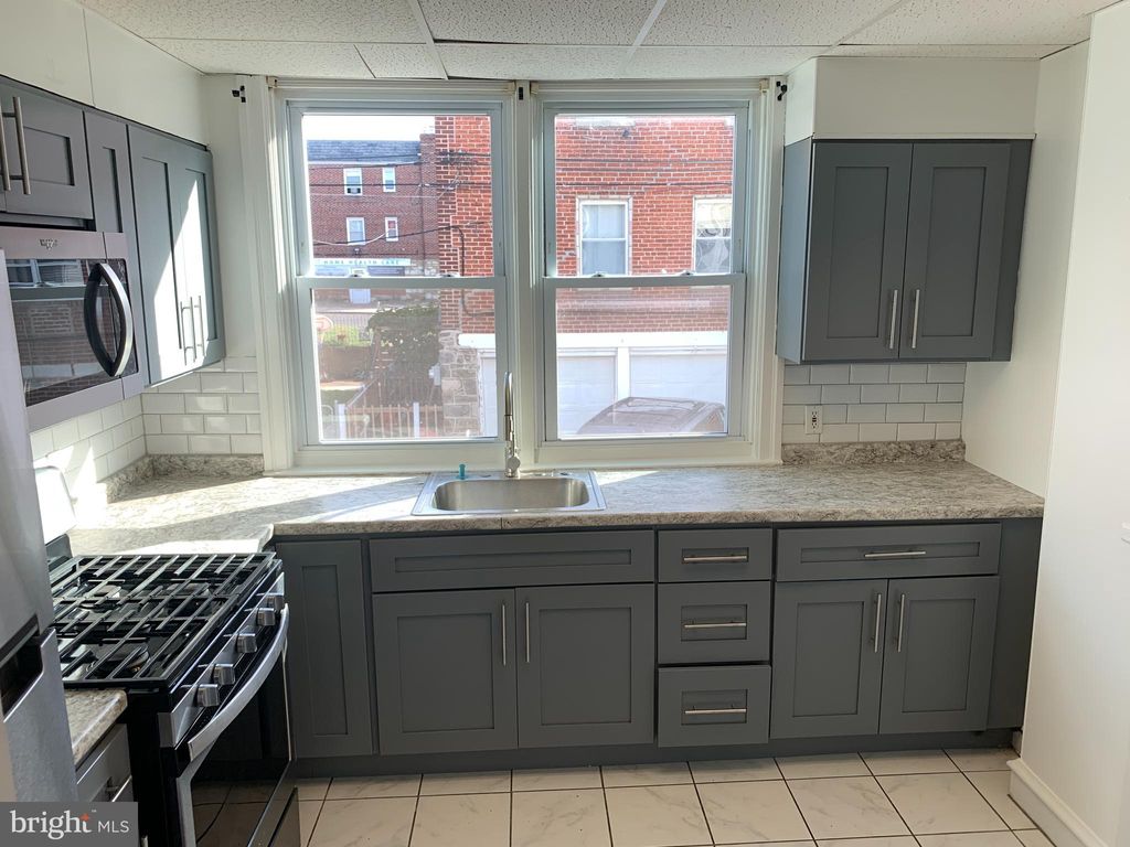 Photo of 4135 Gilham Street, PHILADELPHIA, PA 19135 (MLS # PAPH2562158)