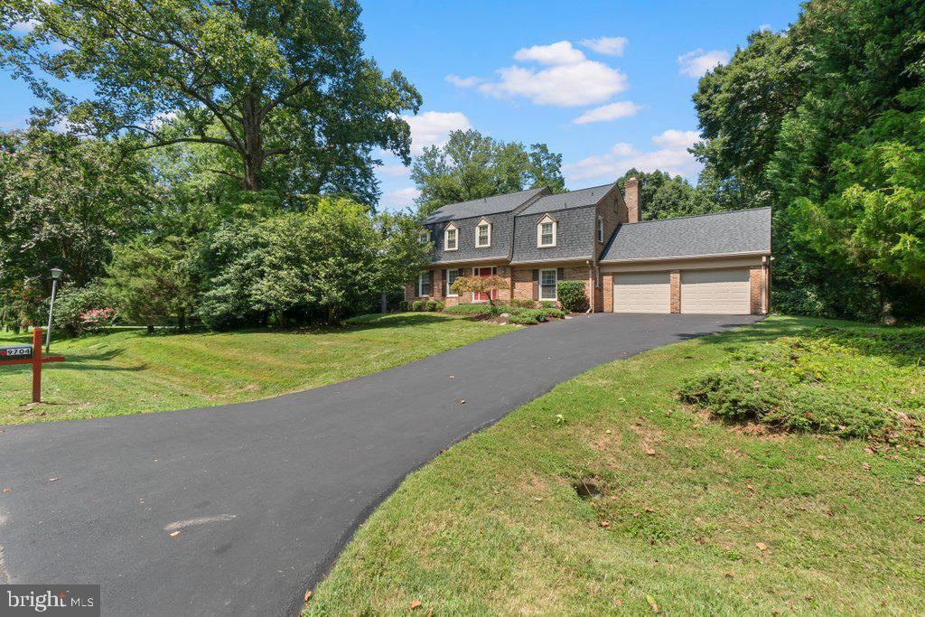*** 1st time for rent *** Welcome to 9704 Hall Road, a stately five-bedroom Dutch Colonial in the highly desirable Heritage Farm community of Potomac. Set on a beautifully landscaped 1/3-acre lot, this home offers classic curb appeal and peaceful living just minutes from Potomac Village and top-ranked schools. Inside, you’ll find gracious formal living and dining spaces, a cozy family room, and a kitchen with new cabinetry and a recently replaced refrigerator. Upstairs, the generous primary suite includes an en-suite bath, with three additional bedrooms and a full hall bath completing the level. The finished lower level features a spacious recreation room with a kitchenette, a fifth bedroom, a full bath, and ample storage. While the home retains much of its original character, it presents a rare opportunity to move into a premier location at a price that reflects its potential for future updates. The flat, private backyard bordered by mature trees offers the perfect setting for outdoor enjoyment in one of Potomac’s most established and sought-after neighborhoods.