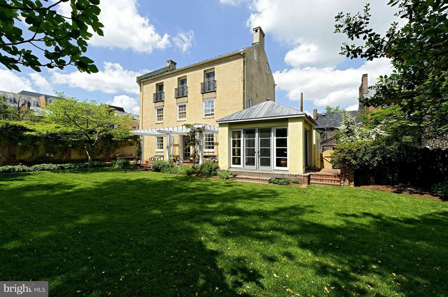 Very Large Yard with privacy plus an exciting residence, right in the middle of Old Town.  Once a tobacco warehouse built 1780, now a contemporary residence with panache!  High ceilings, floor to ceiling glass in the breakfast room overlooking the garden, 2 wood burning fireplaces and a family room with vaulted ceiling.  Off street parking for one car.