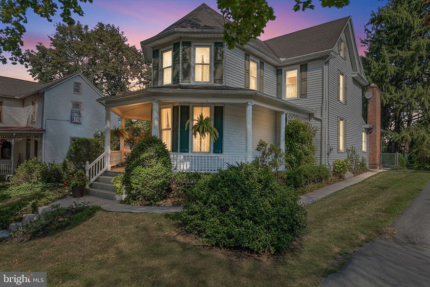 Step back in time with modern comforts in this beautifully maintained late 1800 3-bedroom, 2-bath Victorian beauty. From the inviting wrap-around porch to the timeless hardwood floors and doors, this home is filled with character and warmth. Inside you'll find a formal living room and dining room, a spacious family room with a brick gas fireplace and wet bar, office, Florida room and a convenient, spacious mudroom/ laundry.  Attic and basement available for storage. The private outdoor space is a true retreat: a patio overlooking the in-ground pool, a 2-car garage with workshop and a loft for storage. An original smokehouse is now repurposed as a small storage shed. Additional patio at the back of the yard is currently used as a small basketball court. The entire yard is fenced and has mature landscaping to provide privacy. This rare find blends historic charm with thoughtful updates- perfect for entertaining and making memories.