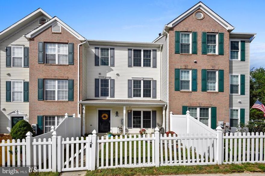 Updated, large 3 bedroom, 2 full baths, 1 half bath, lots of light, wood floors in living room, gas fireplace, 2 bedrooms on 2nd floor. Third floor is all master suite. Vaulted ceiling, attached master bath. This home won't last long. Excellent, quiet neighborhood, with no through traffic.