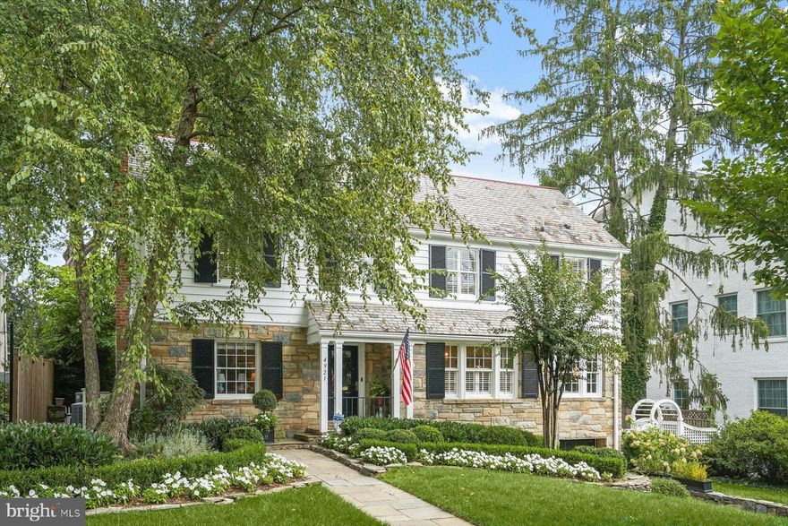 Ideally situated in the sought-after Spring Valley neighborhood of Washington, DC, this exceptional residence seamlessly blends timeless architecture with modern luxury. Thoughtfully renovated in 2022, the home features a stunning chef’s kitchen equipped with premium appliances including a Wolf range, Sub-Zero refrigerator, dual dishwashers, a Scotsman ice maker, custom inset cabinetry, and new hardwood floors. Significant system upgrades completed in 2022 include four fully renovated bathrooms, a 3-ton Carrier Infinity AC and heat pump (upstairs zone), a 75-gallon water heater, a whole-home water filtration system, and energy-efficient spray foam insulation. Fresh interior paint (2021–2022) and newly painted exterior (2025) further enhance this turnkey home. The lower level has been transformed with new LVT flooring, a custom mudroom, laundry area, and two generous walk-in closets. Throughout the home, LED lighting and Lutron Caseta smart switches elevate the ambiance, while CAT6/coax cabling, integrated speakers (kitchen, dining, living, and backyard), Nest cameras (including video doorbell), and dual smart thermostats offer convenience and connectivity. A highlight of the property is the professionally redesigned backyard by Joseph Richardson Design, constructed by Chick Landscaping. This outdoor oasis features an expanded patio, play area, planting beds, new sod, landscape lighting, irrigation, and defined pathways—perfect for entertaining or quiet relaxation. The front yard has also been updated with new sod, lighting, and irrigation. Additional features include whole-home custom closet systems by America Closet Systems (including two spacious walk-in closets in the primary suite), relined and repaired chimney with new granite hearth and surround, and a private driveway with a one-car attached garage. Enjoy the sidewalk-lined streets, nearby shops in Spring Valley, and several area parks and trails. This location also provides easy access to major commuter routes, public transportation, Sibley Hospital, and many other city conveniences.