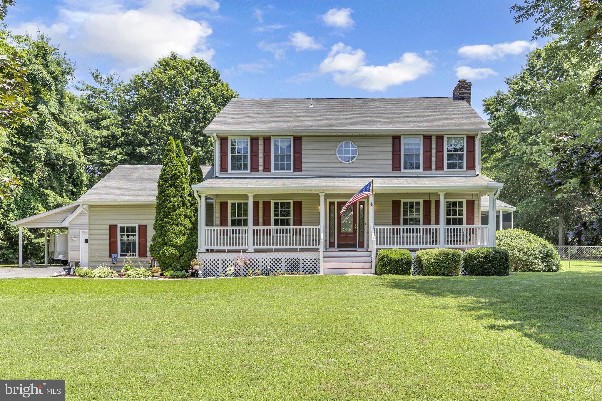 Welcome to 215 Cedar Beach Drive, nestled in the coveted water-privileged community of Cedar Beach on the serene Patuxent River! This expansive approximately 3,000 square foot residence boasts four spacious bedrooms and three-and-a-half updated bathrooms. Upstairs, you'll have 4 bedrooms (the 4th bedroom is through the doorway from the primary suite and is ideal as a nursery or for a younger child), 2 full bathrooms with pristine new carpet! The living room offers a wood-burning fireplace, hardwood floors throughout the main level, and a separate dining room for entertaining! The basement is complemented by luxury vinyl plank flooring with an additional office/possible 5th bedroom with an ensuite bathroom. Step outside to a deck that welcomes you to the huge level fenced-in yard, perfect for outdoor gatherings, with a stunning inground pool and a screened-in porch featuring a sunken hot tub. Additional highlights include brand new kitchen appliances, brand new washer and dryer, and a detached garage with a loft, room for boat storage, and a deeded boat slip, all offering a perfect blend of comfort and relaxation. The Deeded Boat slip is located at the end of Ketch Road with parking and stairs down to the Private Community Pier. There is also a huge community area for gatherings/ picnics, etc! Don't miss this opportunity to own this awesome property!