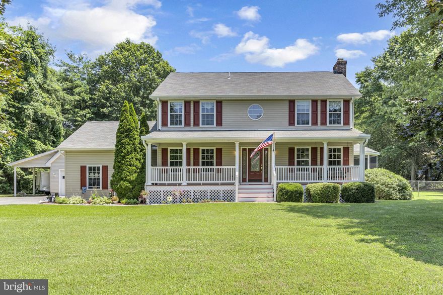 Welcome to  215 Cedar Beach Drive, nestled in the coveted water-privileged community of Cedar Beach on the serene Patuxent River! This expansive approximately 3,000 square foot residence boasts four spacious bedrooms and three-and-a-half updated bathrooms. Upstairs, you'll have 4 bedrooms (the 4th bedroom is through the doorway from the primary suite and is ideal as a nursery or for a younger child), 2 full bathrooms with pristine new carpet! The living room offers a wood-burning fireplace, hardwood floors throughout the main level, and a separate dining room for entertaining! The basement is complemented by luxury vinyl plank flooring with an additional office/possible 5th bedroom with an ensuite bathroom. Step outside to a deck that welcomes you to the huge level fenced-in yard, perfect for outdoor gatherings, with a stunning inground pool and a screened-in porch featuring a sunken hot tub. Additional highlights include brand new kitchen appliances, brand new washer and dryer, and a detached garage with a loft, room for boat storage, and a deeded boat slip, all offering a perfect blend of comfort and relaxation. The Deeded Boat slip is located at the end of Ketch Road with parking and stairs down to the Private Community Pier. There is also a huge community area for gatherings/ picnics, etc! Don't miss this opportunity to own this awesome property!