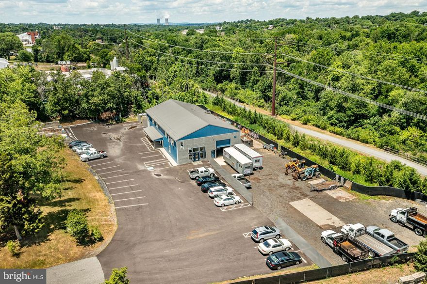 Office/Warehouse For Sale. Phoenixville East Pikeland Township. 1.8 Acre Property with 50x100 Building currently used as a construction Office Warehouse. 2900+ of Office Space on two floors with Central Heat and AC, Beautiful and Modern office area with 11 Individual offices, Reception area, Conference room Bathroom on first floor and second floor, Kitchen and storage areas. Approximately 3000+ Sq. Ft. of Warehouse Space, 3 Phase Electric, Multiple overhead doors (1) 12’ x 14’, (2) 12’x12’, (1) 10’x10’, (1) 10’x14’, (2) 8’x8’ Paved parking area with 25 Parking spaces, addition gravel area parking for Trucks/Equipment. 
New Building and Improvements completed 2017-2018.