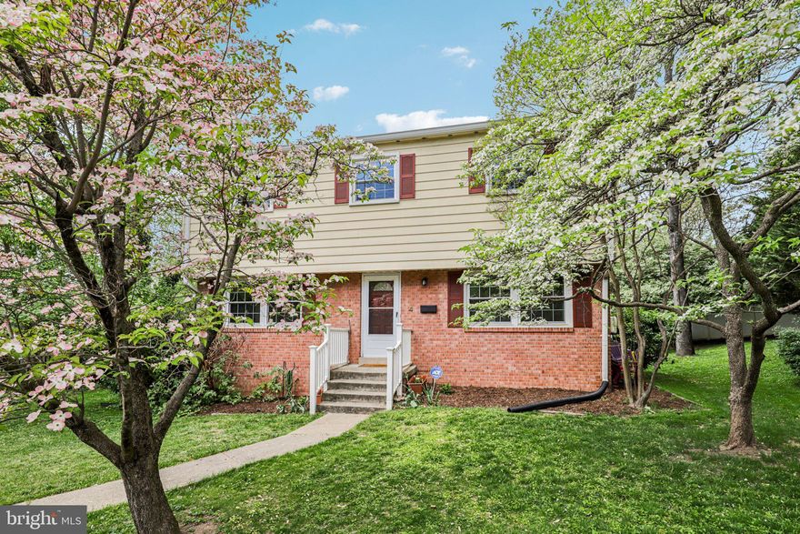 Nestled in a quiet Silver Spring cul-de-sac, this charming Colonial perfectly blends classic comfort with modern updates. The sun-filled, open-concept main level features gleaming hardwood floors and a spacious living room centered around a brick-accented fireplace. Spend quality time with loved ones in the eat-in kitchen, which features oak cabinetry, quartz countertops, premium stainless steel appliances and gas stove. Upstairs has the layout you are looking for, a spacious primary suite with a private en-suite bath, along with 3 other bedrooms and a full bathroom. Head to the finished lower level—a flexible space perfect for a guest suite or office nook, complete with a workshop and walk-up backyard access. Outside, the large lot offers private driveway, landscaped shrubbery, and a shed for extra storage. Unbeatable commuter location: less than 2 miles to Downtown Silver Spring and minutes to Forest Glen Metro, the Beltway, and Montgomery Hills Park.