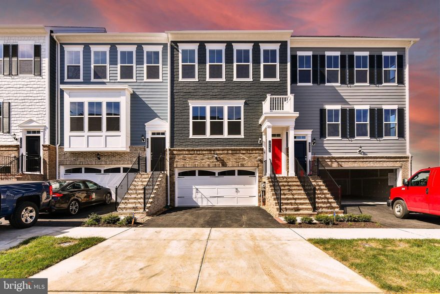 Absolutely gorgeous 4-level, 4Bedroom, 3Full bath, 2Half bath, 2-car garage home with rooftop terrace & amazing view of the Jack Nicklaus Signature, Potomac Shores Golf Course*Light Bright & Open main level features stylish LVP flooring, neutral light grey paint tones, recessed lighting & lots of natural sunlight beaming throughout the many large windows*Living room features sleek gas fireplace & patio door to deck*Gourmet kitchen features granite counters with complimentary subway tile backsplash, oversized island with sink, ample 42" white cabinetry & stainless steel appliances + dining area*Upper level features Primary bedroom with walk in closet & spa-like bathroom featuring frameless tiled shower, tiled floor, soaking tub & dual sink granite vanity*Two additional bedrooms upper level share full bathroom with granite vanity & tiled floor + laundry bedroom level*Head to second upper level featuring loft, powder room & patio door leads to fantastic rooftop terrace with stunning views of golf course*Lower level features LVP flooring, rec room, third full bathroom, garage access & door leading to backyard*All floors wired for Wi-Fi connectivity, main & lower level with full wiring for cable/gaming/DVR*Fantastic Community amenities planned*Shores Club (three pools); Fitness Center; Canoe Club; Social Barn with a living room & demonstration kitchen, Clubhouse/Tidewater Grill, Nine planned sports fields & courts, hiking/biking trails, Outdoor gathering spaces (covered patio & event lawn); Community garden*Footsteps away from Future Town center & VRE Station*

*Available for lease NOW*