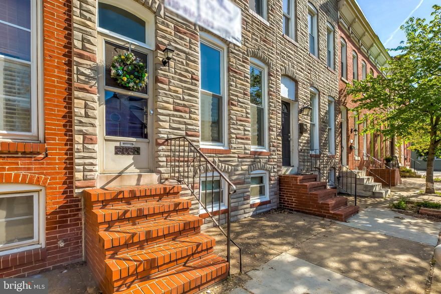 WIDE fully renovated home with high end finishes and PARKING!  The first floor features beautiful historic hardwood floors and trim, a huge family room, dining room, luxury kitchen, walk in pantry, full sized laundry room and full bathroom.   Tons of trim and recessed lights throughout the first floor.   The historic staircase with curved wood railings leads you to the second floor with 3 large bedrooms and a full bath.  All bathrooms feature granite countertops and frameless glass showers.   The unfinished basement is super clean with high ceilings.  Very usable and dry.  New windows in 2018.  2 zone hvac makes this home super efficient!