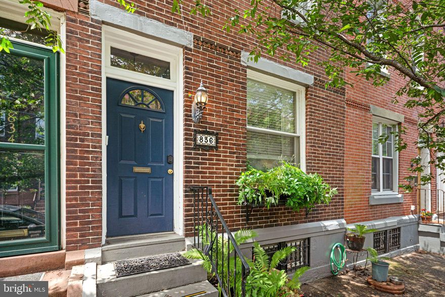 Located on a lovely tree-lined block in Fairmount, this charming three-bedroom, one-and-a-half-bath brick townhouse combines classic design with functional living.  A small entry vestibule with wainscoting leads into the main level, where you'll find high ceilings, hardwood floors, and an open layout. The living room features a decorative slate fireplace, large front window, and beautiful built-in shelving. The dining area connects directly to the open kitchen featuring wood cabinetry, granite countertops, tile backsplash, and stainless steel appliances.  Beyond the kitchen, a large laundry/mudroom offers a utility sink, storage, and a half bath. Outside, the fenced backyard provides a wonderful space for grilling or relaxing.  Upstairs are three bedrooms. The front room has treetop views and a wide closet. The rear bedroom has a bay window, and the middle room works well as an office or nursery. The full bathroom includes a tub/shower, vanity, and window for natural light.  The finished basement adds flexible space for a playroom, gym, or storage.  Located on a tree-lined block in Fairmount, this three-bedroom, one-and-a-half-bath brick townhouse combines classic design with functional living.     This fantastic home  is surrounded by local amenities like coffee shops, bars and restaurants, Whole Foods, community garden, weekly Farmers Market, Kelly Drive and the river, Fairmount Park, and world renowned museums. With easy access to bus routes, getting around the city is a breeze! Fairmount offers a unique opportunity to live in a thriving community with plentiful green space in the heart of the city.