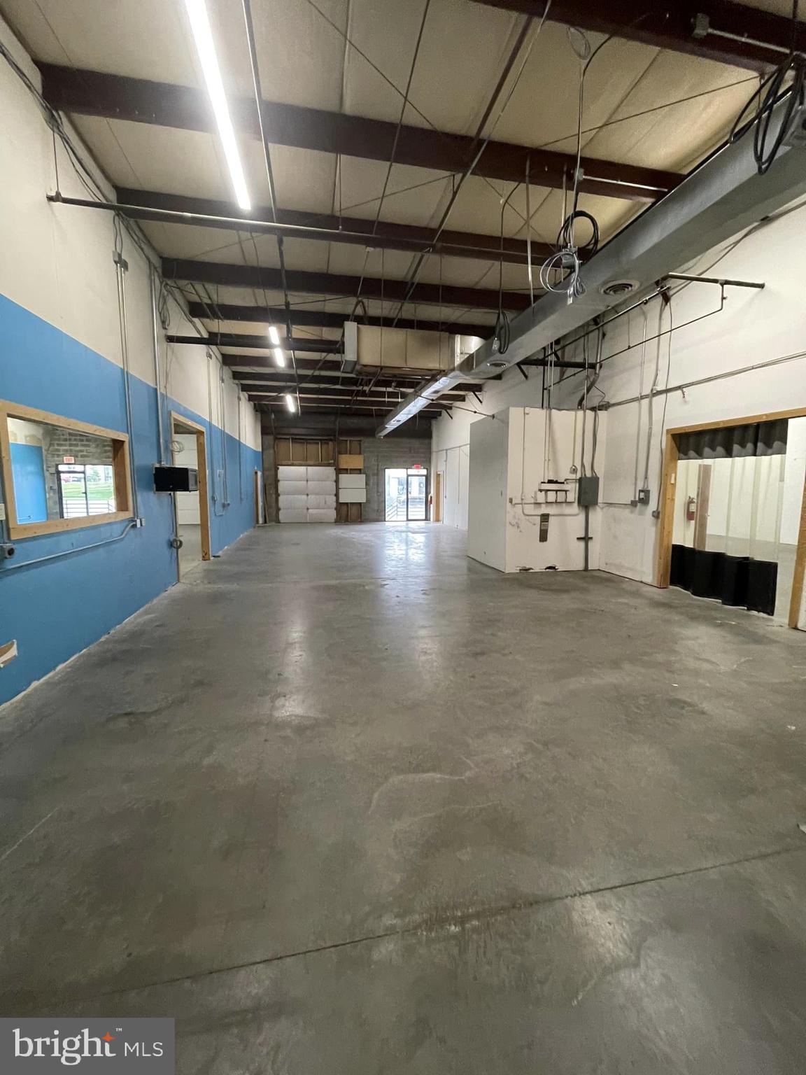 Building 95 Suites B10 is 2,080 SF. Suites B11, B12, B13 can be combined for a total of 8,320 SF.
All four units are AIR CONDITIONED AND GAS HEATED.
LISTING AGENT MUST ACCOMPANY SHOWING ON THESE FOUR UNITS
Each Unit contains a restroom. Suite B13 contains an Office. Warehouse Space Located Near I-70 Exit and Adjacent to East Patrick St. & Monocacy Blvd. Buildings are concrete block & metal construction. Warehouse Ceiling Height is 14 ft.. Free Surface Parking with Security Lighting. All units have Gas Heat and are Sprinklered & Monitored.