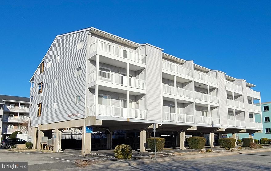 What does your OC coastal retreat look like?  Ocean Block / Steps to the sand & surf ? Peeks of the Atlantic Ocean to the east and Isle of Wight Bay to the west from your private balcony? Sought-after Midtown Location? Community Swimming Pool & Sundeck? Assigned Parking?  A few blocks from Rt. 90 Bridge /Ocean City Expressway?  This condo checks all those boxes!Welcome to Tiffanie by the Sea! This well-maintained family-owned property (not a rental) offers an amazing opportunity to the future OC Locals. The open floor plan provides space for entertaining and relaxing after a day on the beach. This is a 2-bedroom and 2-bathroom end unit which features a large kitchen island that seats 4, a dining area with a bay window, a bright living room with a sliding door leading to a balcony with a storage closet for beach toys and a stacked washer/dryer. ADDED BONUS – this unit is being sold furnished! No moving hassles. Turnkey ready to use day 1. 
When you are done with the beach, some of the best restaurants & entertainment that OC has to offer are within walking distance. Make plans to visit Alley Oops, Mackey’s Bayside Bar & Grill, Johnny’s Pizza, Nicks Mini Golf – Maui Golf, Knot There, Fractured Prune, Dunkin, Bad Monkey, Faglers Island, Sunsations, Candy Kitchen,  Bayside Boat & Jet Ski Rentals & Parasail, Odyssea Watersports Jet Ski Rentals, Atlantic Beverage Center,  Subway, Exxon, 7-11, Dumsers Dairyland and World Famous Seacrets. You get the picture.  You can park the car in one of the 2 assigned parking spots and never use it if you don’t want to. 
Whether you're dreaming of summer getaways, weekend escapes, or rental income, this is your chance to own a slice of Ocean City coastal living!