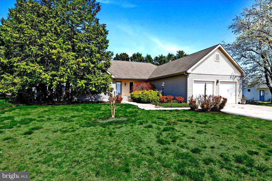 Easy Coastal Living in a Peaceful Setting

Welcome to 203 Millstone Lane—a beautifully maintained 3-bedroom, 2-bath ranch offering the ease of one-level living in a quiet, country-like setting. From the moment you arrive, the covered front porch invites you into a bright, airy living space with soaring ceilings, a cozy gas fireplace, and atrium doors that open seamlessly to the outdoors—perfect for everyday living and entertaining.

The kitchen is both stylish and functional, featuring crisp white cabinetry, black granite countertops, ample prep space, and a peninsula with breakfast bar seating. It flows effortlessly into the sunlit dining area and out to a stunning 3-season room surrounded by sliding glass doors—your own private retreat with peaceful backyard views.

The primary suite is thoughtfully tucked away, offering a relaxing escape with a spa-like bath, including a soaking tub, separate shower, dual vanity, and walk-in closet. Two additional bedrooms and a full bath are located on the opposite side of the home, providing comfort and privacy for guests or family.

A laundry/mudroom with garage access, generous storage throughout, and an oversized garage add everyday convenience. Outside, enjoy a spacious deck and patio—ideal for entertaining or unwinding—plus a storage shed for all your tools and beach gear.

Located in the sought-after Mill Landing community in Millsboro, you’re just minutes from shopping, dining, and Delaware’s beautiful beaches.

Whether you're looking for a primary home or a coastal getaway, this one checks all the boxes. Live your best life—at the beach.