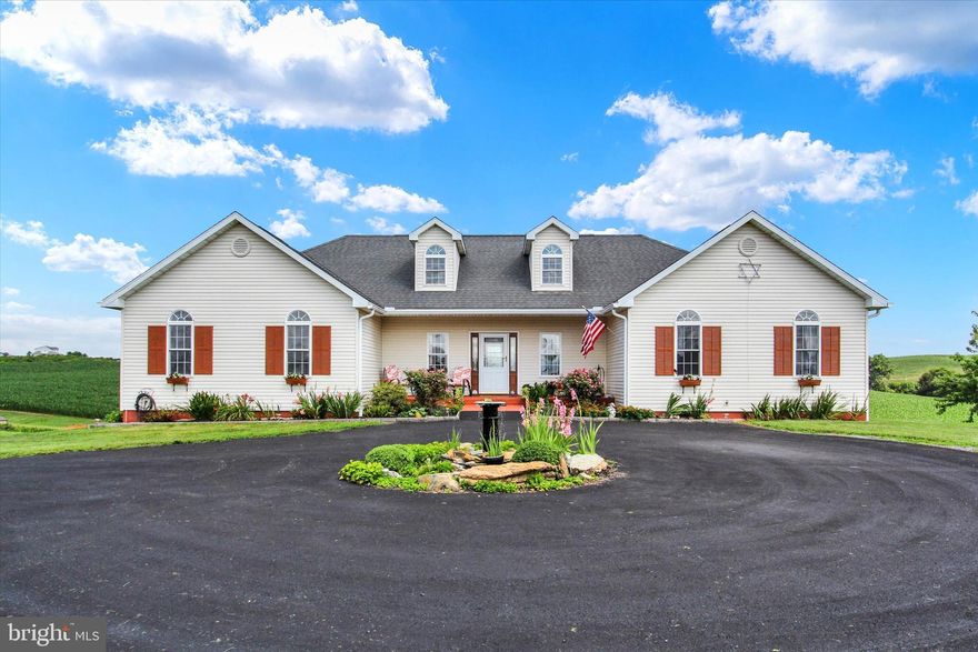 COUNTRY YET A SHORT COMMU TE TO TOWN. COMING HOME MEANS A CIRCULAR DRIVEWAY WITH A FOUNTAIN. OPEN THE DOOR TO A SPACIOUS FOYER WITH AN OPEN LIVING ROOM, DINING ROOM AND EQUIPPED KITCHEN WITH CENTER ISLAND AND BAR. ASK ABOUT THE APPLIANCES. THIS IS A SPLIT LIVING PLAN WITH 3 BEDROOM AND BATH AND OWNER'S BEDROOM AND BATH AND A DEN/OFFICE OR GUEST BEDROOM. OWNER'S  BEDROOM FUTURES 4 CLOSETS. OWNER BATH HAS DOUBLE BOWL VANITY, A WHIROLPOOL TUB AND SHOWER. AND FLOOR HAS A GRET HOME OFFICE OR MAN'S CAVE OR CRAFT ROOM. LOWER WALKOUT LEVEL HAS A LAUNDRY ROOM, EXERCISE ROOM, REC ROOM, WORKSHOP, STORAGE AND 2 WALK OUTDOORS WITH STORE UNDER THE DECK. HEATING IS BY PROPANE GAS WITH OWNER OWNED TANK. THE 3.52 ACRES GIVE ELBOW ROOM, FRUIT TREES AND THE HOME HAS GREAT OPEN VIEWS.