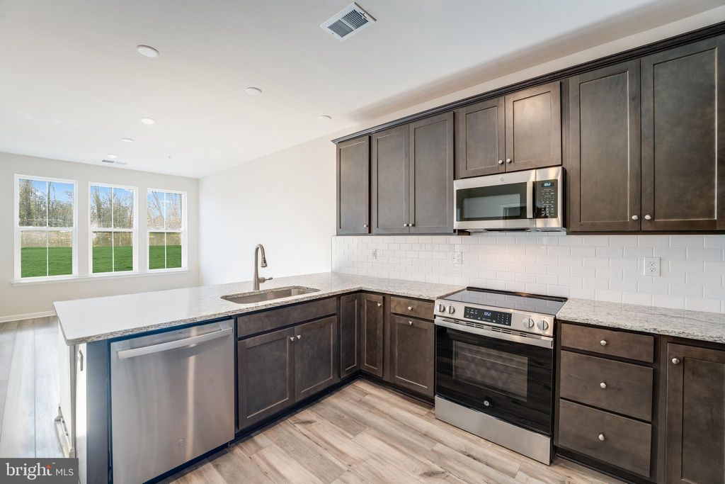 Photo of 4003 Seaside Alder Road #0102 - ASTER, BOWIE, MD 20720 (MLS # MDPG2182002)