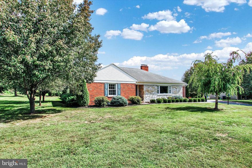 When entering into this inviting beautiful  brick and stone rancher located in Eastland Hills you will immediately appreciate the warmth of this very spacious floor plan. This main level living Home offers 4 bedrooms and 2 full baths with a tastefully finished basement. Beautiful hardwood floors throughout the recently painted main level, the living room offers a brick fireplace with built-in shelves and lots of natural lite thoughout.  A formal dining room, a nice size working kitchen with lot's of upgrades including state of the art stainless steel appliances, tile flooring with plenty of counter and cabinet space, a center island and pantry. Walk out to a large covered patio that opens to a extensive brick patio, pergola and a fenced yard! The full basement is finished offering a family room, dry bar, stone fireplace, separate sitting room, a bedroom, full bath, two large storage rooms, new energy efficient washer/dryer and a walk-up stairway to the outside. A must see!