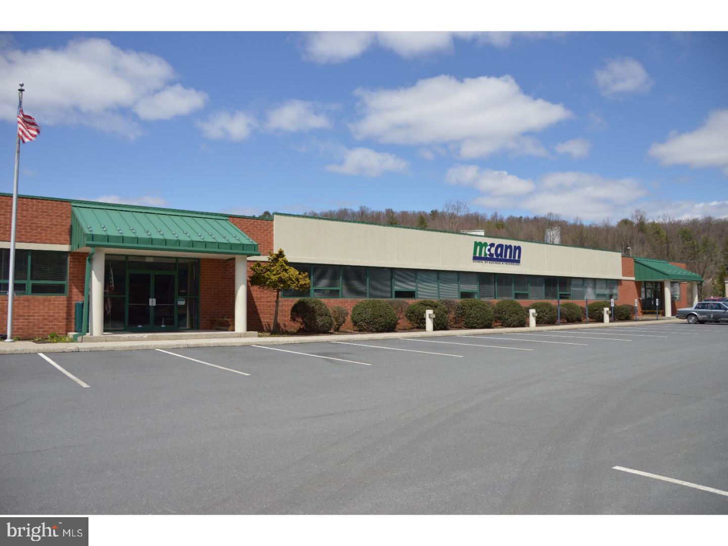 "Class A" single floor multi use building formally utilized as an education center offered for sale or lease. Well maintained climate controlled building with 225 car on site paved parking. Level lot with public sewer, water and natural gas. Underground storm water controls with ample green areas. Accessible to traffic controlled intersection of Route 209 and 901 Pottsville. Public transportation to site.,Class A Building. 225 car on site paved parking. Level lot. Well maintained facility.