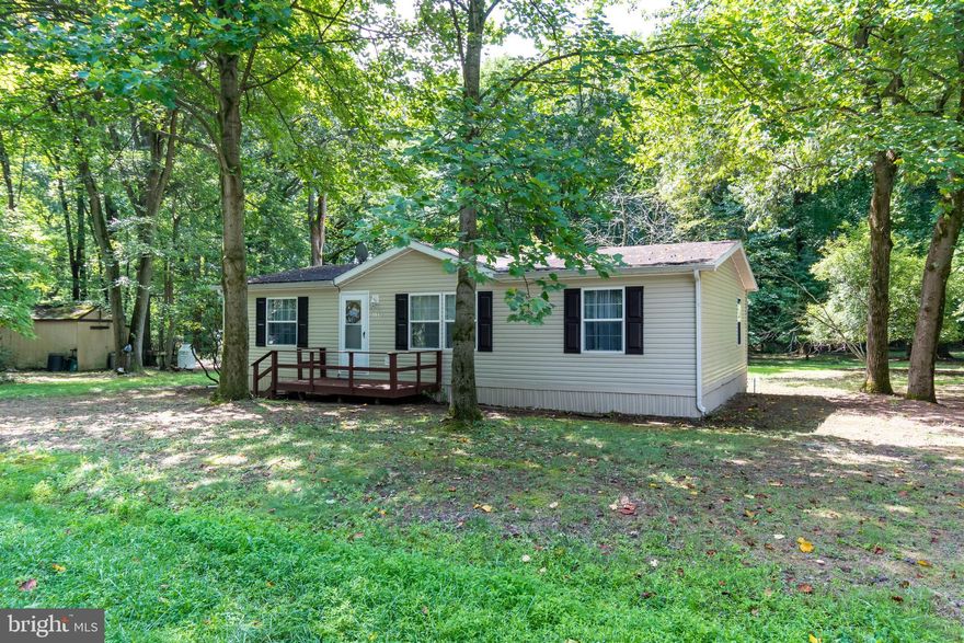 21123 Montana Avenue is located in a Chesapeake  Bay water oriented community on the Eastern Shore . You can make this a full time residence or your get away space.    You have water views as you drive up and enter your driveway.  In Tolchester Estates you will have access to the private community beach, boat ramp and  you will be welcomed  to the community center that holds a variety of events  through out the year. All ready to move into and  you can be in to enjoy the Fall  season.  

This  home offers a split floor plan.  Main bedroom and  full bath on the left as you come in the front door and then two bedrooms and full bath to the right. Open living room, kitchen,  eat in kitchen  and extended bar for stools. Out back you have a deck and  the back door where you can enter into the mud room/laundry room.  The screen porch will let you relax looking out into a nice size private  back yard   with mature trees and deer to watch.

Home is being sold as is.