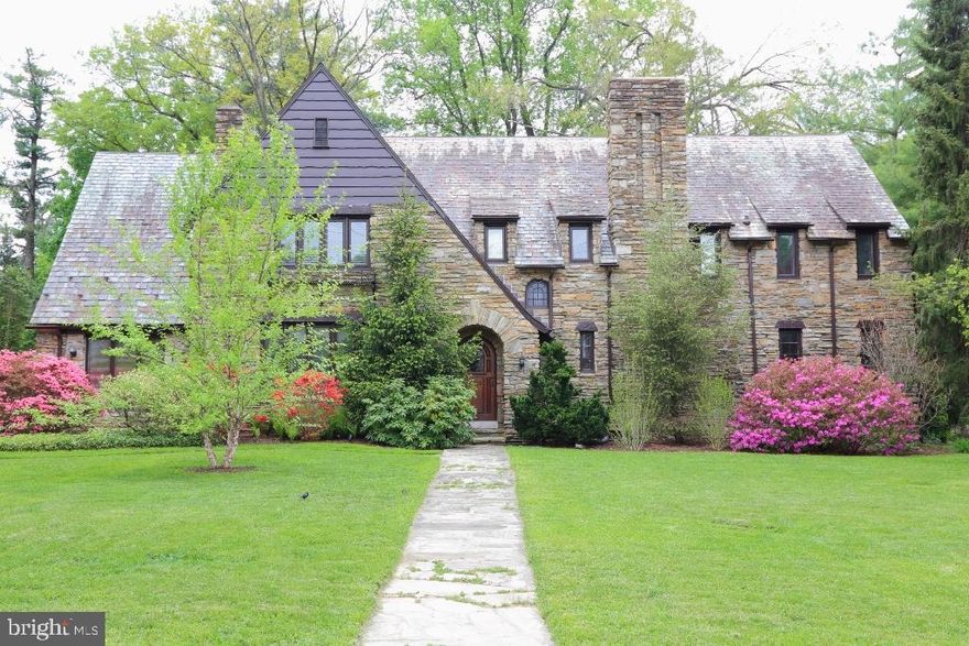 Classic Tudor exterior with graciously updated interior. Beautiful cherry floors on 1st floor with refinished classic oak on 2nd. Kitchen has stainless appliances and granite. Spectacular home with a private lot.