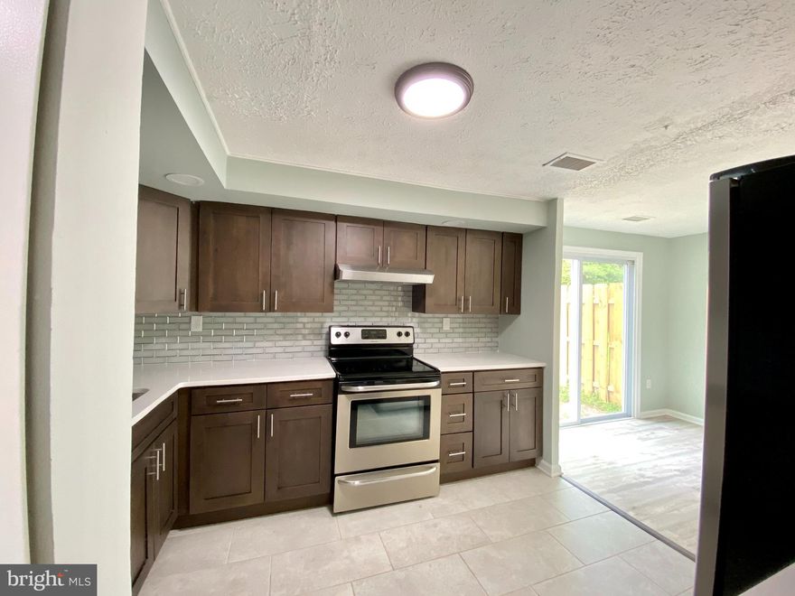 Gorgeous 3 Bedroom 2 Full Bath townhouse with a very large yard, Double car Driveway in Beautiful Waldorf!! Renovated Kitchen w New cabinets, Quartz countertop, Porcelain floor tile,  Freshly Painted, New luxury flooring in main level, New carpet upper, Windows and Roof replaced few years back.