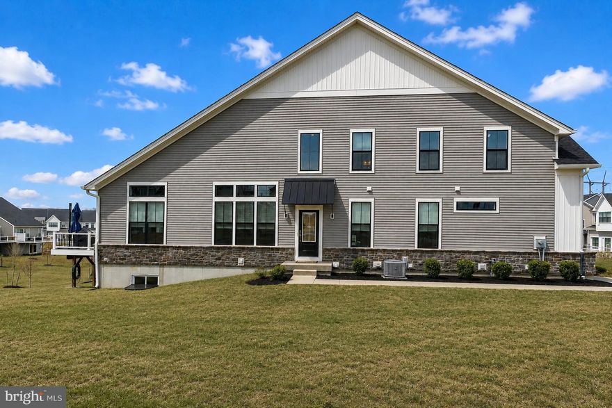 Only a relocation makes this exceptional Belliotti model available in The Reserve at Center Square, a sought-after Toll Brothers community built in 2022/2023. Located in the award-winning Methacton School District, this nearly new home offers modern luxury, thoughtful upgrades, and the convenience of low HOA fees.

From the moment you step through the front door, you’re welcomed by abundant natural light reflecting off designer paint colors and beautiful hardwood floors. The open and spacious layout was designed for both comfortable everyday living and effortless entertaining.

The stunning Chef's kitchen is truly the heart of the home, featuring soft-close cabinetry, quartz countertops, a gas cooktop, and an extended island with seating for six—perfect for gathering with family and friends. Just beyond, the great room centers around a cozy gas fireplace, creating a warm focal point for relaxing evenings.

Sliding doors lead to a large Trex-style deck, providing the ideal outdoor space for grilling, entertaining, or simply enjoying the sunshine. The lot itself feels especially open and expansive compared to others in the community, offering a wonderful sense of space rarely found in carriage home living.

Conveniently located on the main level is the private primary bedroom suite, offering both comfort and privacy. Enter through elegant French doors into a spacious retreat featuring an ensuite bath with double sinks, generous counter space, and a walk-in shower. The suite continues into an impressive walk-in closet upgraded with custom closets, providing exceptional storage and organization.

Down the hallway past the beautiful turned staircase, you’ll find a pantry closet, powder room, laundry area, and coat closet, all leading to the one-car garage.

Heading upstairs, a versatile loft area greets you at the top of the stairs. Currently used as an open play space, similar homes have utilized this area as a home office. It could also be enclosed to create an additional bedroom if needed. The second floor also includes two additional bedrooms, along with a bonus room currently used for closet/storage space, and a beautifully designed second full bathroom with dual sinks that is anything but cookie-cutter.

The basement is ready to finish and currently serves as a spacious storage and exercise area. It also includes a rough-in for a future bathroom, making it easy to expand the home’s living space if desired.

Located just off Route 73 between Blue Bell and Skippack, the home offers easy access to outstanding restaurants, shopping, and local conveniences, making this location as desirable as the home itself.

With modern construction, flexible living space, an expansive-feeling lot, low HOA fees, and a location within the highly regarded Methacton School District, this home truly stands apart.

Come see for yourself what makes this home so special.