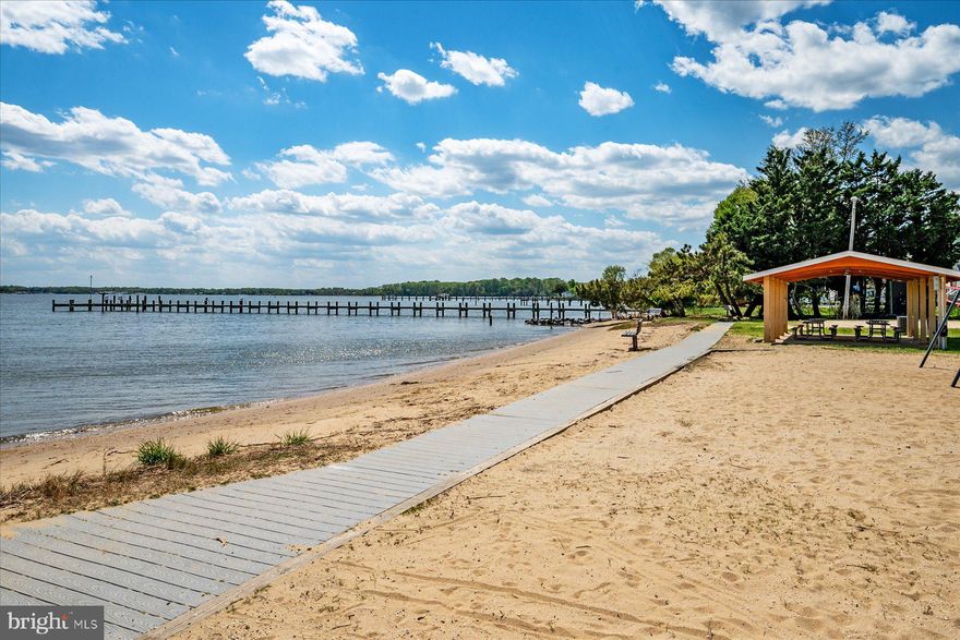 Life in Hillsmere revolves around the water — the Chesapeake Bay, the South River, and a lifestyle that most people only experience on vacation.  Welcome to 298 Edgemere Drive, located in one of Annapolis’ most beloved waterfront communities, where the rhythm of everyday life is shaped by fresh air, sunset skies, and a neighborhood designed for living well.  Hillsmere Shores offers an extraordinary collection of amenities rarely found in a private community. Residents enjoy access to one of the largest private beaches on the South River, where sandy shoreline, panoramic water views, and unforgettable sunsets become part of your daily routine. Just moments away, the marina and community boat ramp provide effortless access  — making boating, sailing, fishing, jet skis, and paddleboarding feel like second nature.  The lifestyle continues on land with a community pool, playgrounds, kayak storage, volleyball court, and vibrant neighborhood events that bring neighbors together all year long. It’s the kind of place where weekends are spent at the beach, kids ride bikes until sunset, and neighbors quickly become lifelong friends.  Within this exceptional setting, is a fantastic property, offering five bedrooms, three full baths, and more than 2,600 square feet of living space — a size and layout that is increasingly rare in this coveted waterfront community.  Inside, the home offers bright, welcoming living spaces designed for both everyday comfort and entertaining. Multiple living areas provide flexibility for modern lifestyles — whether hosting friends after a day on the water, creating private work-from-home space, or comfortably accommodating guests and family.  But what truly sets this home apart is the lifestyle that surrounds it.  Morning walks along the Bay.  Launching the boat on the South River.  Summer afternoons at the community beach.  Evenings watching the sun melt into the Chesapeake.  All of it just minutes from Historic Downtown Annapolis, world-class sailing, marinas, waterfront restaurants, and the charm of Maryland’s capital city.  Homes offering this amount of space, flexibility, and access to the Hillsmere waterfront lifestyle rarely come to market.  298 Edgemere Drive is more than a home — it’s an invitation to live the Chesapeake Bay life Annapolis is famous for.