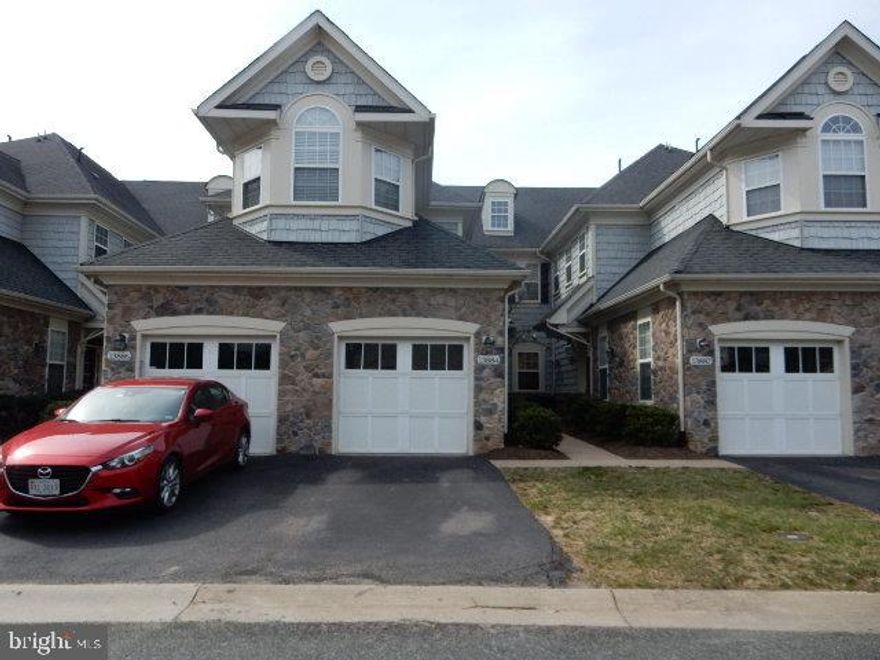 Comfortable Living. No Lawn mowing, no snow plowing. VRE walking distance. Commuter lots. Rush hour bus services to DC and Pentagon. Close to I95. Gorgeous Condo that is light filled and ready to move in. Open living room and dining room, Enjoy your morning coffee on the private balcony that is overlooking trees and walking path. Master suite and luxurious master bath with double sink, soaking tub and separate shower. Enjoy relaxed open space from your deck. Agent owned