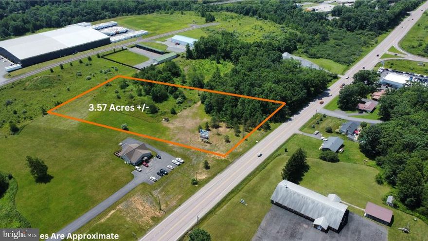 Perfect opportunity for development! Located on a high traffic highway this 3.57 Acre +/- commercially zoned lot has approximately 330 feet of road frontage giving it incredible visibility for a potential business AND has an income producing billboard already installed on site! This lot is level and mostly cleared already. Located next to a county business park and multiple additional businesses. Call today for more information!