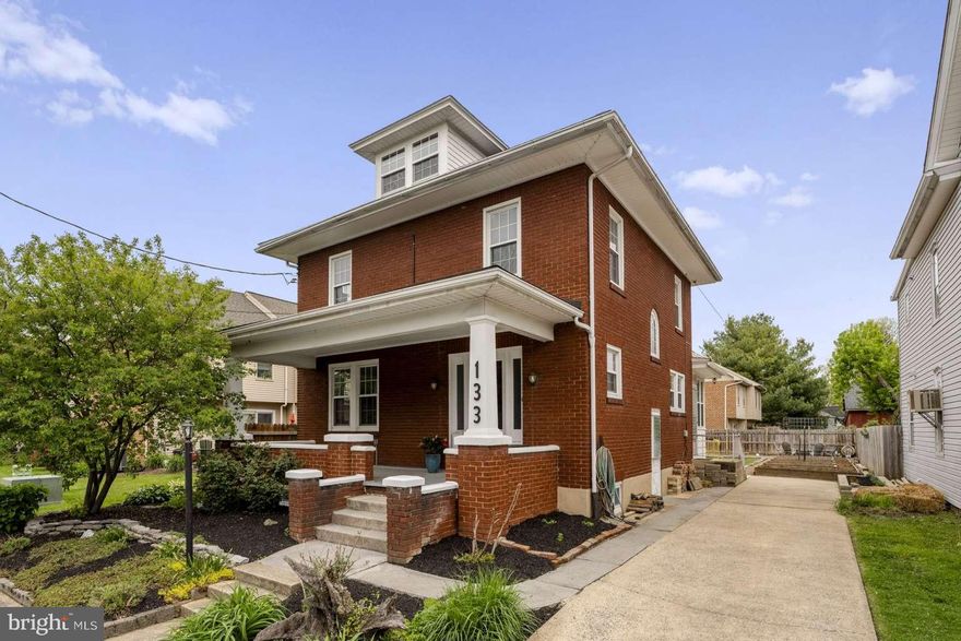 Open House Friday, May 8th @ 5-7PM Saturday, May 9th @ 1-3PM
Welcome to this beautifully maintained 1929 brick two-story home located on a quiet street in Manheim Borough. From the moment you arrive, the full front porch and mature landscaping set the tone for a home that blends timeless character with everyday comfort.

Step inside to find original wood trim, warm finishes, and a layout that feels both inviting and functional. The first floor offers comfortable living spaces along with a separate, spacious dining room large enough for gatherings with friends and family, as well as a large kitchen with ample cabinetry and counter space for preparation.

The home features one full bathroom on the first floor and a second full bathroom on the upper level. Upstairs, you’ll find three bedrooms along with convenient second-floor laundry, adding to the home’s everyday practicality.

The home is equipped with wall-mounted mini split systems installed in 2021, providing efficient heating and cooling. A high-efficiency water heater was installed in 2022, and the roof was replaced in 2025, offering peace of mind for years to come.

The basement spans the full footprint of the home and provides excellent storage and flexibility. Above, the attic presents a great opportunity for future expansion into additional living space. Hardwood flooring exists throughout the home and offers the option to refinish and further enhance its original character.

Outdoor living is a true highlight of this property. The backyard offers a spacious lawn, raised garden beds, and a layout designed for both relaxation and entertaining. The current owners utilize a dedicated area for a fire pit with ample space for many guests, creating a great setting for gatherings. A concrete patio connected to the home serves as an outdoor dining area, and a shed provides additional storage. The driveway offers off-street parking for two vehicles.

Located less than half a mile from Market Square, this home is within walking distance to local restaurants, First Thursday events, seasonal celebrations, and community gatherings, including the annual Christmas tree lighting. From everyday convenience to year-round events, this location makes it easy to stay connected to the community.
